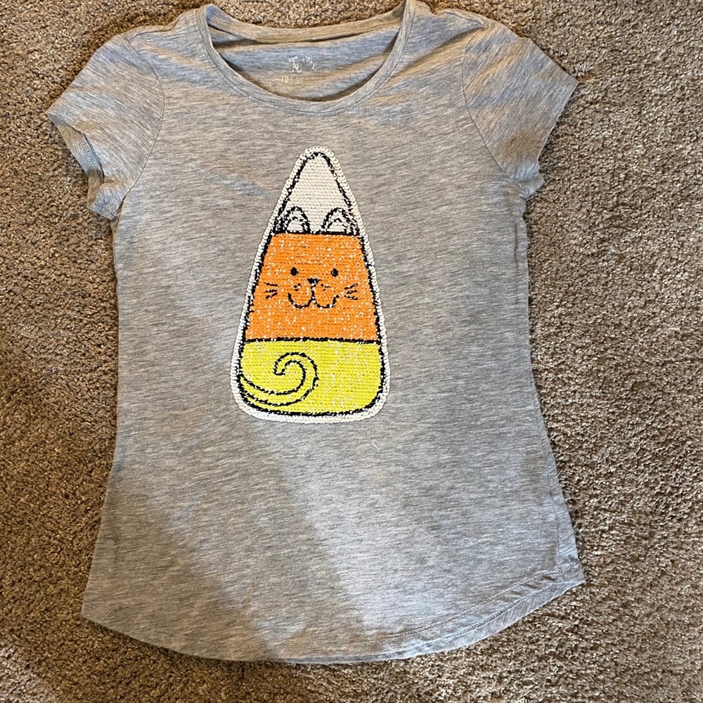 Sequin reversible candy corn tee. Justice size 10.